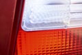 Rear red and white car glass lights close up Royalty Free Stock Photo