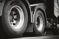 Rear of Semi Truck Wheels Tires. Diesel Truck. Freight Trucks Transport.