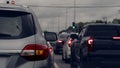 Rear side of cars on the asphalt road. Royalty Free Stock Photo