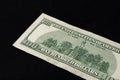 Rear side of old one hundred dollar american currency on black background Royalty Free Stock Photo