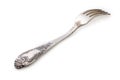 Rear side of old rusty vintage silver fork isolated on a white background, close up Royalty Free Stock Photo