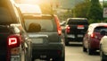 Rear side of pickup car black color with turn on brake light on asphalt roads. Royalty Free Stock Photo