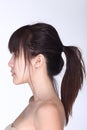 Rear Side View of asian woman black hair, studio lighting white