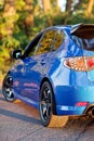 Rear side view of blue sport car Royalty Free Stock Photo