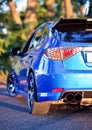 Rear side view of blue sport car Royalty Free Stock Photo