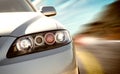 Rear side view of a sport car in blurred motion Royalty Free Stock Photo