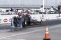 Dragster in action on the race track at the starting line