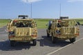 The rear of 2 specialised Army Patrol Land Rovers used in deserts and Hot countries waiting to take part in a Public Display.