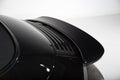 Rear spoiler on black sports car