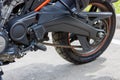 rear suspension of Harley-Davidson Pan America 1250 Motorcycle on parking at spring day, close view