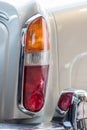 Rear tail light cluster on classic vintage car. Slightly simplified image. Royalty Free Stock Photo