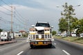 Rear of tow truck loading broken car of crash accident on the road Royalty Free Stock Photo