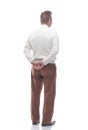 Rear view. adult casual male looking at blank screen