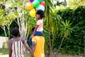 African American family spending time together in their garden. Royalty Free Stock Photo