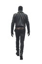 rear view of a African handsome man wearing a black leather jacket and dark pants. Royalty Free Stock Photo