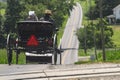 Rear View of an Amish Couple in an Open Horse and Buggy Royalty Free Stock Photo