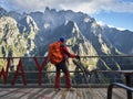 Rear view of asian trekker looking at mountain view