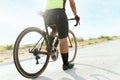 Rear view of an athlete riding his bicycle Royalty Free Stock Photo