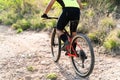 Rear view of an athlete training on a road bike Royalty Free Stock Photo