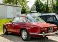 Rear view Beautiful luxury vintage red Alfa Romeo car parked on