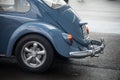 Rear view of blue old Volkswagen beetle parked in the street