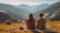 Rear view, Boyfriend and girlfriend sitting and looking at the beautiful scenic green meadow on mountain