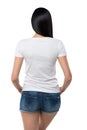 Rear view of the brunette girl in denim shorts and white t-shirt. Royalty Free Stock Photo