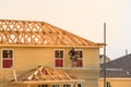 Builder on Wooden House Royalty Free Stock Photo