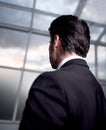 Rear view. businessman looking out office window Royalty Free Stock Photo