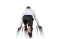 Rear view of a businessman in ready to start running position Royalty Free Stock Photo