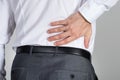 Rear View Of Businessman Suffering From Back Ache