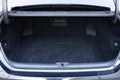 Rear view of the car open trunk. Modern sedan car with open empty trunk. The car boot is open for luggage. A lot of Royalty Free Stock Photo