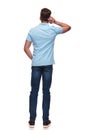 Rear view of casual man wearing a blue polo shirt Royalty Free Stock Photo