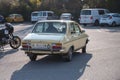 Rear view of a classic light yellow Renault 12 on the street