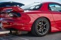 Rear view of a classic red Japanese Mazda RX-7 sports car