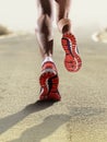 Rear view close up strong athletic female legs running shoes sport woman jogging