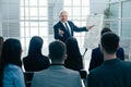 Rear view. company employees applauding at a work meeting