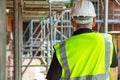 Rear View of a Construction Worker or Builder on Building Site Royalty Free Stock Photo