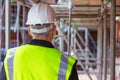 Rear View of a Construction Worker on Building Site Royalty Free Stock Photo