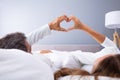 Couple Making Heart Shape With Hands Royalty Free Stock Photo