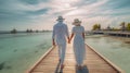 Rear view of a couple walking along a wooden pier at sunset. Man and woman in white robes and straw hats. Generative AI.