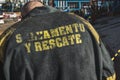 Rear view of a Cuban firefighter's jacket with the words "rescue and salvage" on them