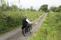 Rear view of a 1940 delivery man on a country road Royalty Free Stock Photo