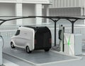 Rear view of delivery van in charging station Royalty Free Stock Photo