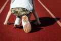 Rear view of a determined athlete ready to run on a treadmill. The concept of a sports lifestyle, training, sport, determination