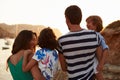 Rear View Of Family Watching Sunset Over Harbour Royalty Free Stock Photo