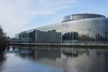 Rear view of the famous european parliament in border the Il river with reflection