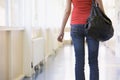 Rear view of female college student in university Royalty Free Stock Photo