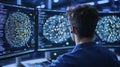 Focused Programmer at Computer Monitors with Data Visualizations