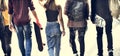 Rear view of group of school friends walking outdoors lifestyle Royalty Free Stock Photo